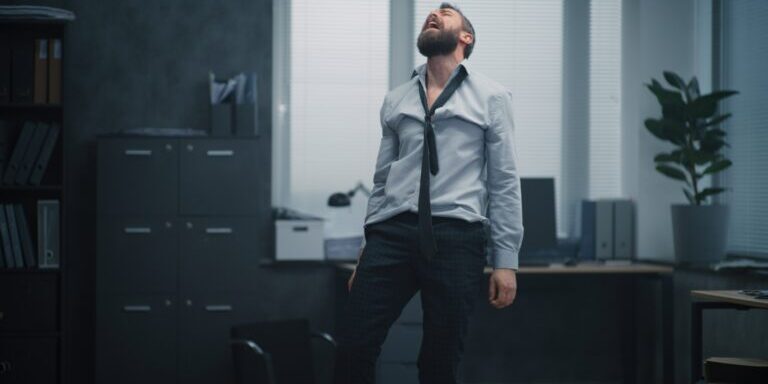 Angry,,Aggressive,Office,Worker,Loses,Temper,,Throws,Boxes,And,Papers