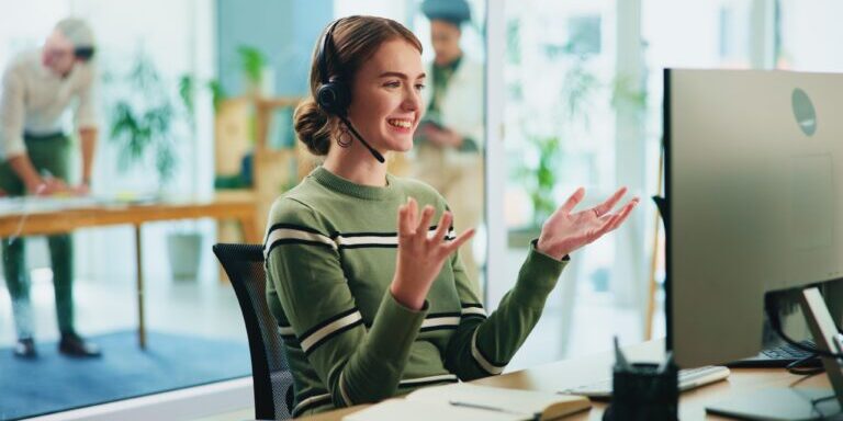 Happy,,Woman,And,Headset,With,Computer,In,Call,Centre,Of