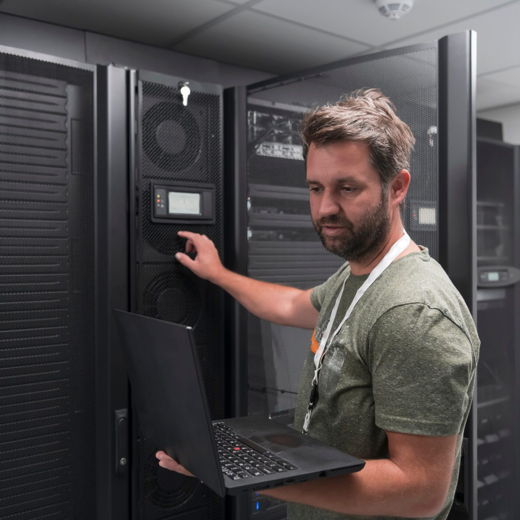 Data,Center,Engineer,Using,Laptop,Computer,Server,Room,Specialist,Facility